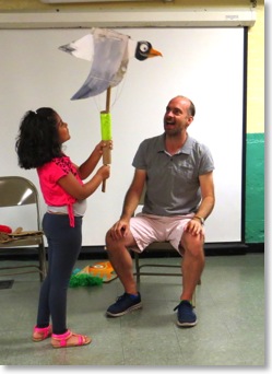 Teaching Artist Kevin Ray and Youth Participant with Laughing Gull Puppet